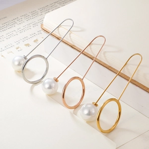 Elegant U-shaped hairpins with pearls and metal rings in silver, gold, and rose gold finishes