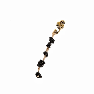 Detail of golden snake hair charm with black natural stones for bohemian braids