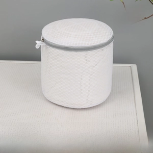 Detail view of milky white 15x17cm fine mesh bra laundry bag with cylinder shape
