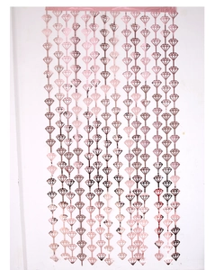 Full view of rose gold diamond-shaped foil curtain for wedding and party decorations