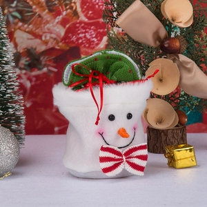 Christmas snowman plush gift bag with red bow and green drawstring for holiday treats