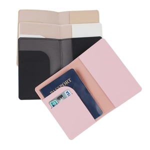 Detail view of colorful PU leather passport covers showing internal card slots and holder