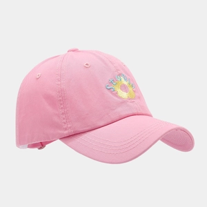 Detail of pink cotton baseball cap with yellow flower embroidery and STUDIO lettering