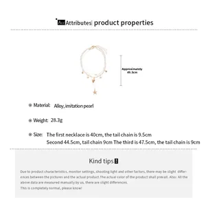Detailed view of multilayer necklace featuring starfish, conch shells and pearls charms