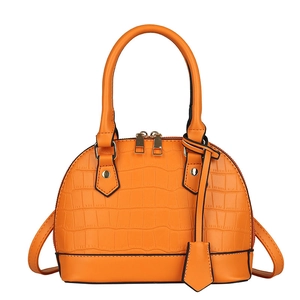 Bright orange shell bag with crocodile texture, top handles and adjustable strap