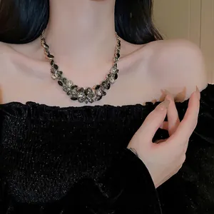 Luxurious water drop fringe necklace with black gemstones for elegant evening gowns