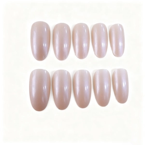 Macro shot of 10-piece pearlescent pink almond press-on nails with smooth metallic finish
