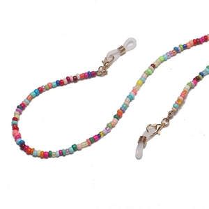 Close-up of colorful beaded eyewear chain with gold metal clasps and silicone loops
