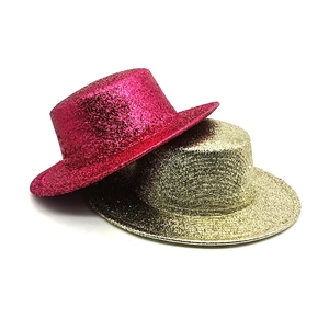 Detail of rose red and gold glitter top hats for parties featuring metallic sequins
