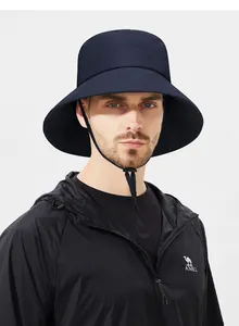 Detail of waterproof outdoor bucket hat and jacket with windproof drawstring and logo