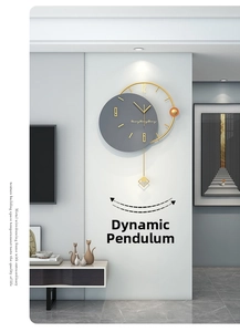 Detail view of modern grey wall clock with golden metal frame and swinging pendulum