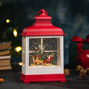 Christmas lantern water globe with Santa and reindeer scene in vintage red and white
