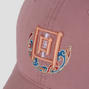Pink baseball cap featuring Chinese cloud embroidery and character in high detail