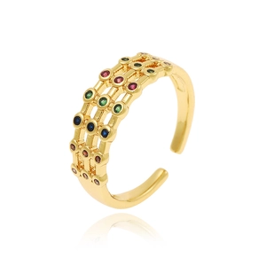 Detail of adjustable gold ring with three rows of multi-colored zircon stones