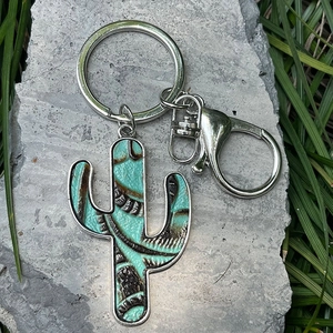 Western style cactus keychain with embossed leopard leather insets on natural stone