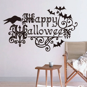 Detail of Happy Halloween wall decal with bats and crows on a white living room wall