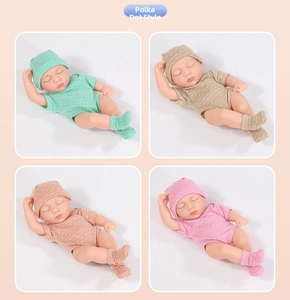 Detailed set of 20cm reborn baby dolls in four polka dot outfit colors with matching caps