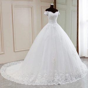 Elegant off-shoulder bridal gown with intricate lace embroidery and long cathedral train