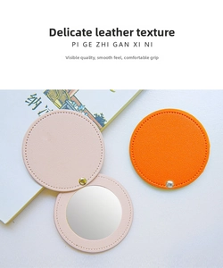 Detail of portable PU leather makeup mirrors with stitching and secure snap closure