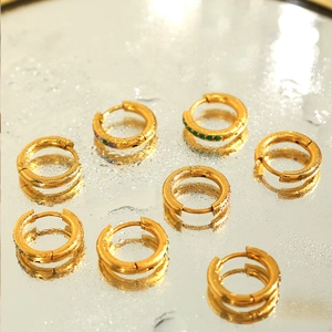Set of eight gold stainless steel hoop earrings with colorful zircon stones on water drops