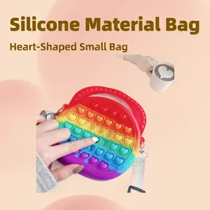 Rainbow heart-shaped silicone pop toy bag for kids with adjustable woven crossbody strap