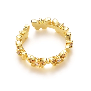 Elegant gold butterfly open ring with micro-pave crystals on white background