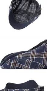 Detalle de gorra plana de cuadros con visera rígida y hebilla metálica ajustable