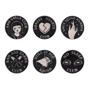 6-piece set of minimalist black and silver enamel pins featuring Sad Girls Club motifs