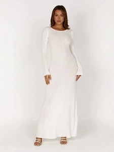 Elegant white long sleeve knit dress featuring a slim fit silhouette and backless design