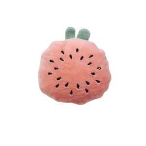 Plush watermelon fruit slice toy in pink and green colors with soft texture and seeds