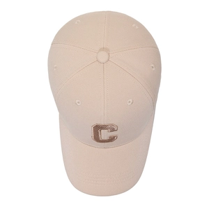 Beige cotton baseball cap with metallic embroidered letter C on a white background