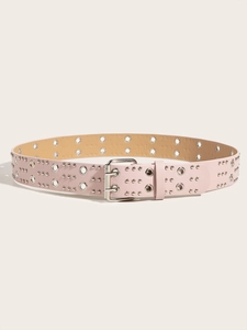 Detailed view of pink leather punk belt with double prong buckle and silver metal eyelets