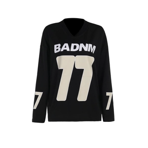 Women's black oversized graphic sweatshirt with white BADNM 77 print and long sleeves