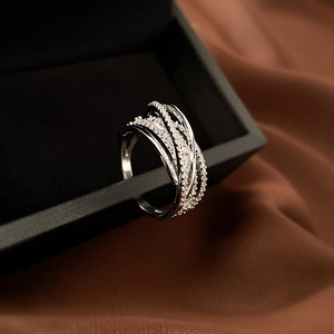 Sparkling silver layered criss-cross ring with white zircons on premium silk