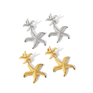 Boucles d'oreilles étoile de mer en plaqué or 18K et argent au style marin texturé