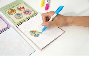 Close-up of a child using a magic water pen on a reusable coloring book for toddlers