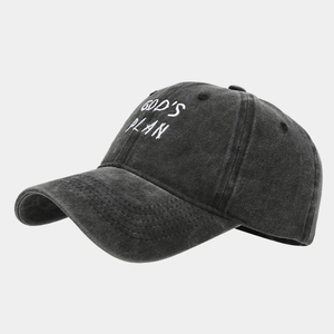 Detailed side view of washed cotton baseball cap with white GOD'S PLAN embroidery