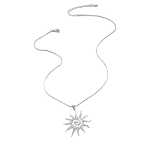 Detail of silver sun pendant necklace with sleek snake chain and lobster clasp closure