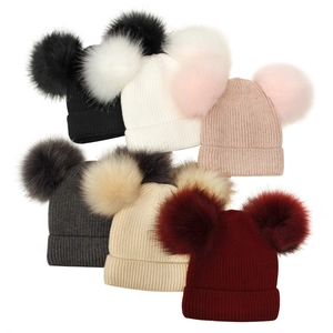 Winter double pom pom knitted hats for women and kids in various colors with ribbed texture