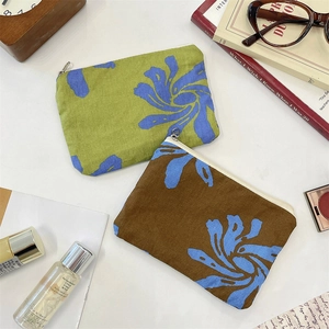 Zippered fabric pouch with floral pattern for coins, lipstick and accessories