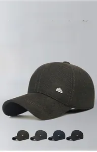 Detail view of winter baseball cap with hidden ear flaps and thick warm fleece lining