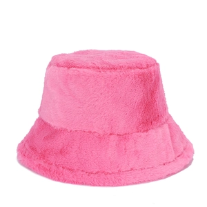 Close-up of fluffy hot pink plush bucket hat showing faux fur texture and soft fibers