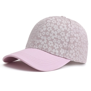Women's pink baseball cap with floral pattern embroidery and structured brim design