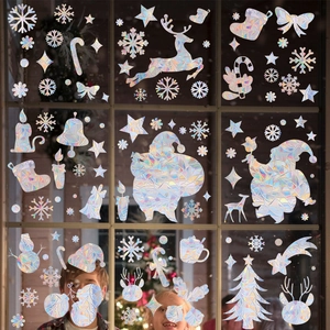 Rainbow laser Christmas window stickers featuring reindeer and snowflakes on glass