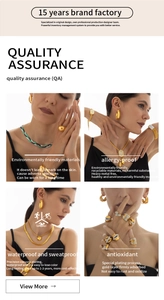 Close-up of gold geometric jewelry showing vacuum plating for 2-3 years color retention