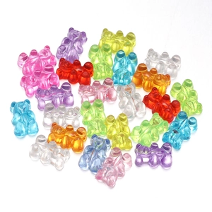 Colorful translucent acrylic gummy bear beads for DIY jewelry making on white background