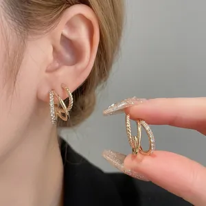 Three-layer gold hoop earrings with zircon paving and twisted texture design