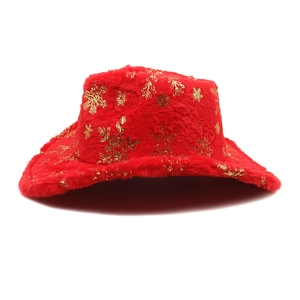 Detail of red plush bucket hat with golden snowflake patterns for Christmas season