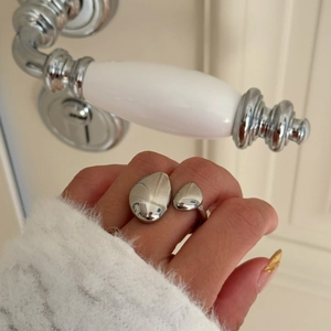 Minimalist silver-tone irregular polished open ring with asymmetric pebble design