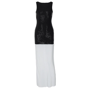 Detailed view of the black sequined bodice and white pleated skirt on a summer dress